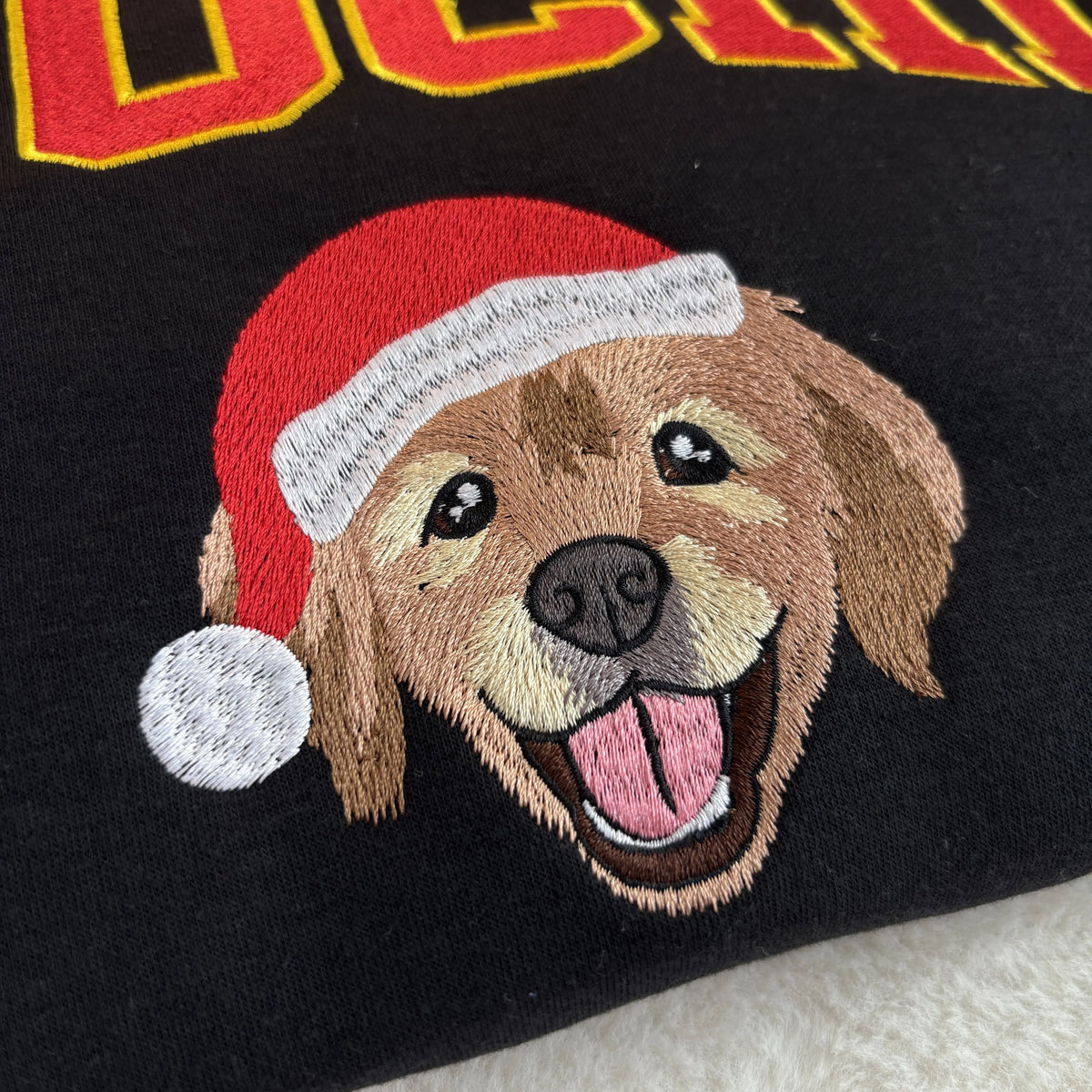 PetFiestas® Varsity Style Embroidered Pet Christmas Sweatshirt - Dog Face with Santa Hat Crewneck- Varsity Colorful Desi